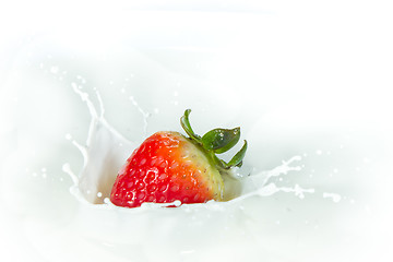 Image showing strawberry splashing into milk