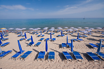 Image showing beach with chairs and umbrellas