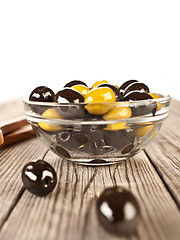 Image showing Olives on a wooden table