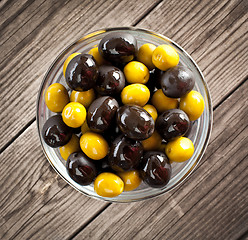Image showing Olives on a wooden table