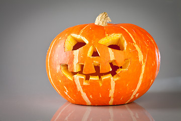 Image showing halloween, old jack-o-lantern on grey