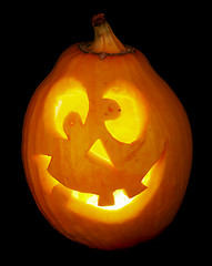 Image showing scary old jack-o-lantern on black.