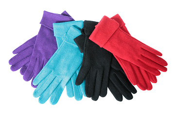 Image showing Multi-coloured woollen gloves on a white background