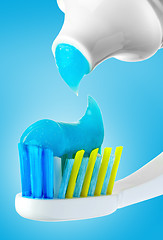 Image showing Dental brush and tube with paste.