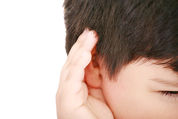 Image showing A little boy trying to hearing the sound around him - What did y