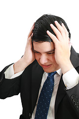 Image showing Man frustrated with hands on his head. 