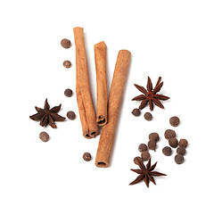 Image showing Black peppercorns, anise stars and cinnamon sticks