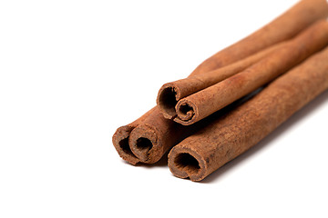 Image showing Cinnamon sticks on white background