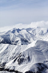 Image showing Snowy mountains in haze