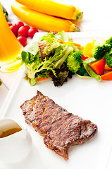 Image showing juicy BBQ grilled rib eye ,ribeye steak and vegetables