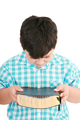 Image showing portrait of a boy with a Bible in hand  and prayed