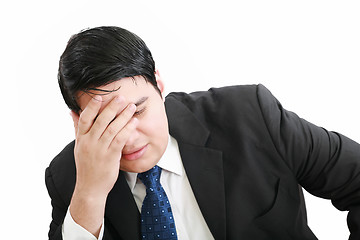 Image showing Portrait of a young business man depressed from work against whi