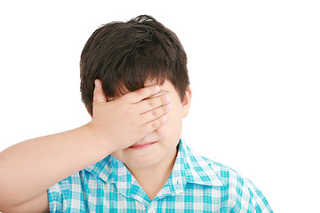 Image showing portrait of sad crying little boy covers his face with her hand