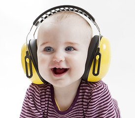 Image showing young child with ear protector