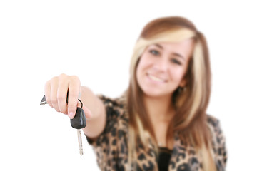 Image showing Young caucasian woman holding car key. Image with shallow depth 