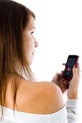 Image showing Pretty woman talking by mobile phone