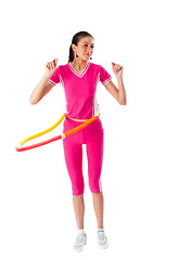 Image showing Young attractive woman holding hula hoop