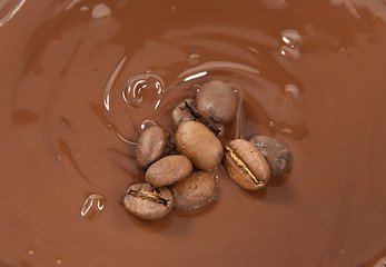 Image showing beans on a bed of chocolate