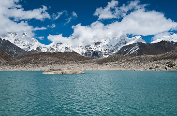 Image showing Clouds and Sacred Lake near Gokyo in Himalayas