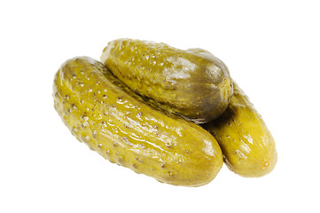 Image showing Three pickled  cucumbers.  Gherkins.