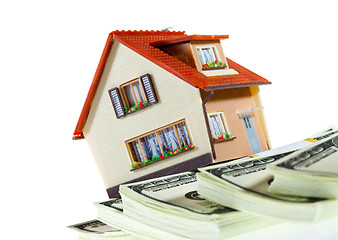 Image showing house on packs of banknotes