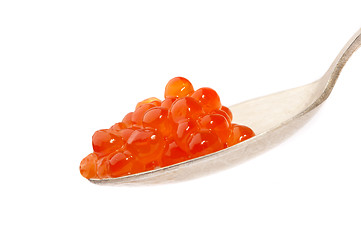 Image showing Red caviar on the spoon, on a white background 