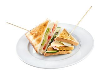 Image showing Two sandwiches on a plate