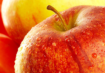 Image showing Fresh apple with drops of water.