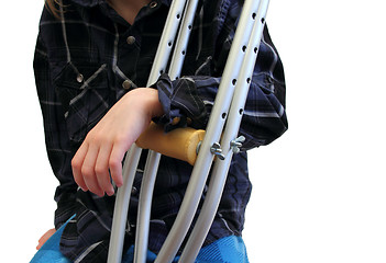 Image showing kid and crutches