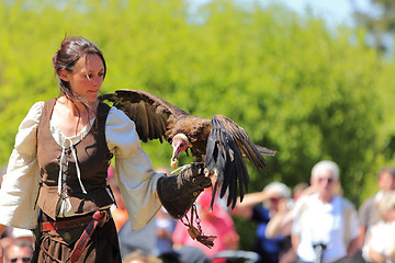 Image showing Female bird tamer