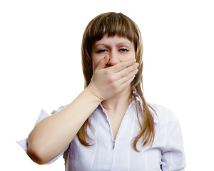 Image showing young girl covers her mouth with his hands