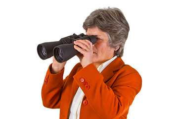 Image showing Female senior business woman with binoculars