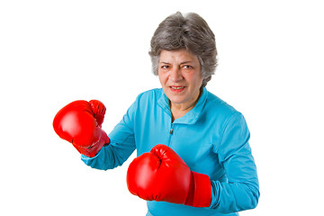 Image showing Female senior with boxing gloves