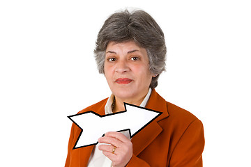 Image showing Female senior with blank arrow