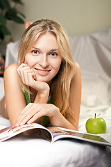 Image showing beautyful woman with green apple