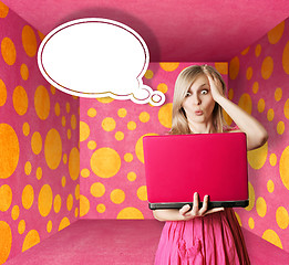 Image showing blonde in pink dress with laptop and bubble