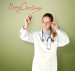 Image showing doctor woman writting Merry Christmas