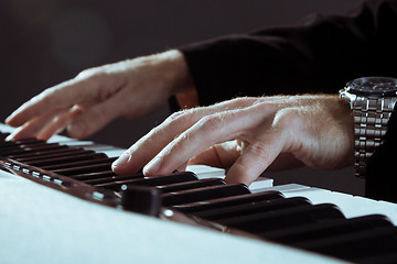 Image showing Playing the piano 