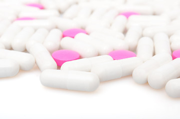 Image showing Pink Pills and White Capsule