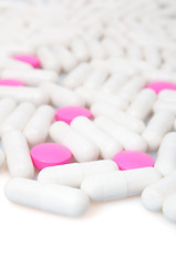 Image showing Pink Pills and White Capsule