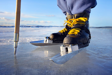 Image showing ice skating on lake 