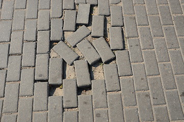 Image showing Small tiled sidewalk without few ones.