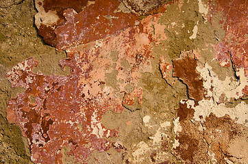 Image showing Old painted wall loosing paint.