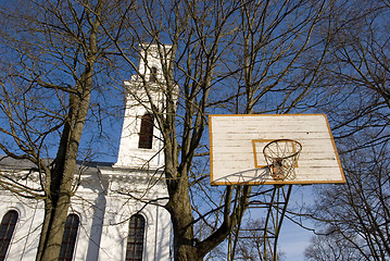 Image showing Basketball yard near church.
