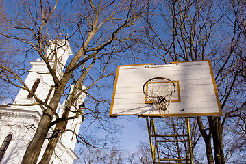 Image showing Basketball yard near church.