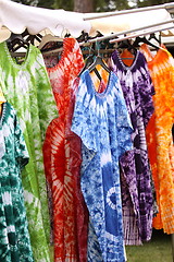 Image showing African dresses colored on a market for the sale