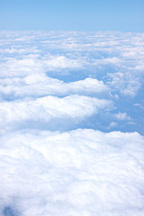 Image showing clouds and blue sky seen from plane