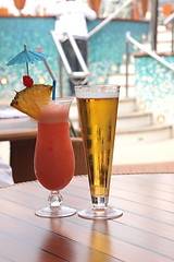 Image showing glass of fruit cocktail and a glass of beer