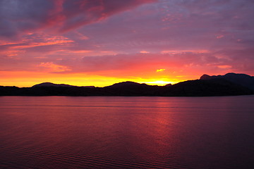 Image showing sunset view from a boat off the coast of norway