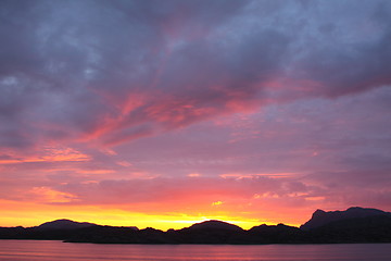 Image showing sunset view from a boat off the coast of norway